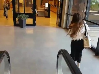 Cute asian girl with remote vibe outside