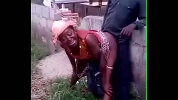 African woman fucks her man in public