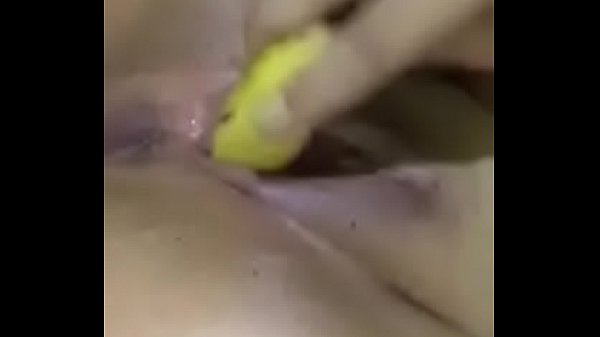 Filipina with a banana